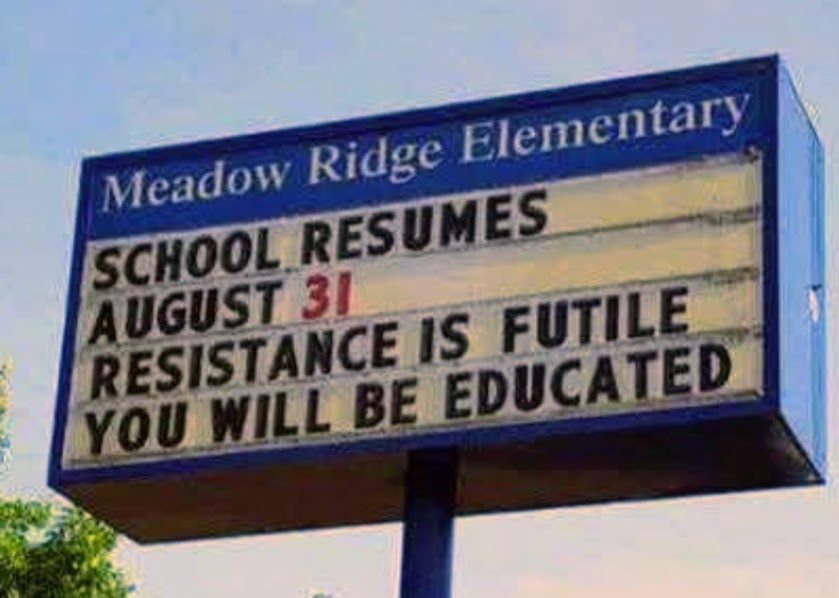 Meadow Ridge Elementary sign reading: School resumes August 31. Resistance is futile. You will be educated.