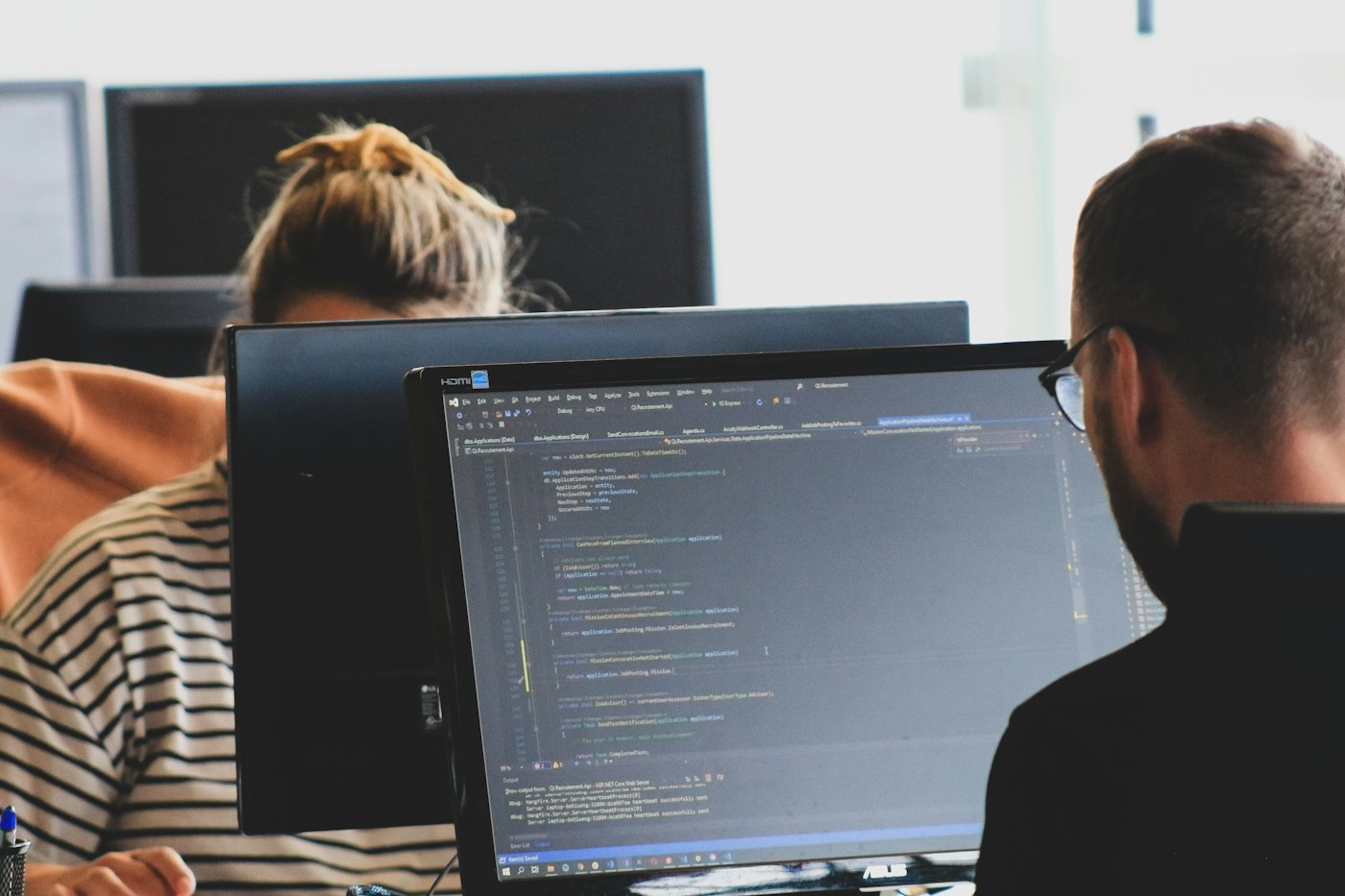 Developers working together at their computers