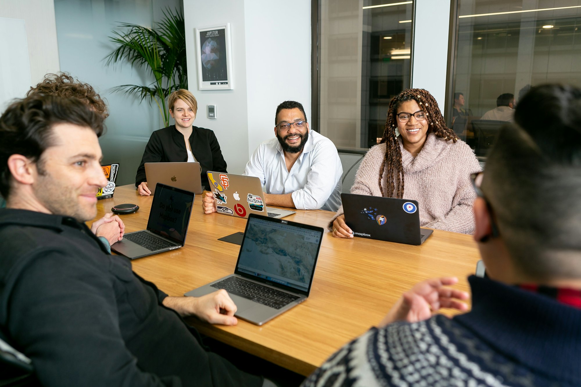 Colleagues working together at a meeting table